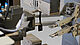 ASTM D412 - Tensile test on elastomers and rubber - detailed view of elastomer dumbbell specimen, specimen grip and extensometer