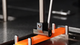 Heat deflection temperature: heat deflection temperature according to ASTM D648 and ISO 75: detailed view of 3-point bending die with specimen
