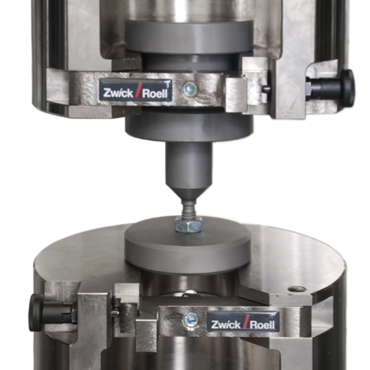 Dispositif d'essais pour l’essai sur écrous conformément aux normes DIN EN ISO 898-2, ASTM F606-2 et DIN EN ISO 3506-2