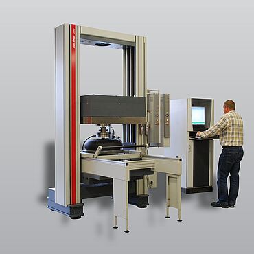 Spring testing machine for pneumatic springs