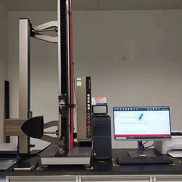 zwickiLine  25 kN universal testing machine with micro specimen grips and the laserXtens 115HP