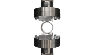 In the tube-flattening test to ISO 8492, a tube ring is compressed using compression platens.