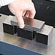 Positioning the specimen for the drop weight test