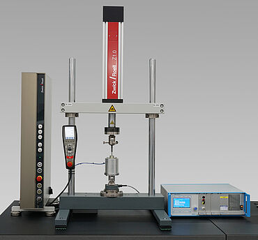 Solenoid testing with electromechanical servo testing actuator
