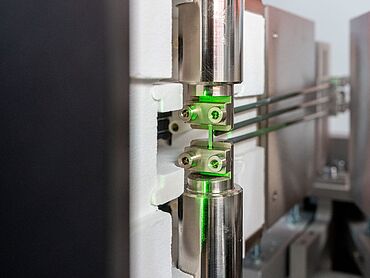 Laser extensometers are ideal for strain measurement on mini specimens from an initial gauge length of 1.5 mm