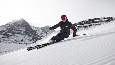 Skier with Stöckli skis