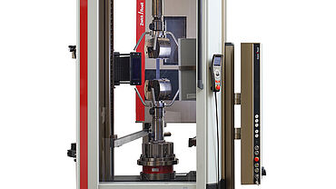 ASTM D3039: Versuchsaufbau mit Zugprüfmaschine Z100, Probenhalter und Temperierkammer