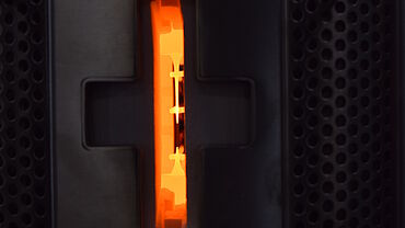View of the specimen through the furnace port after completion of the tensile test