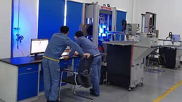 Automated tensile tests on steel are performed in the testing laboratory in China.