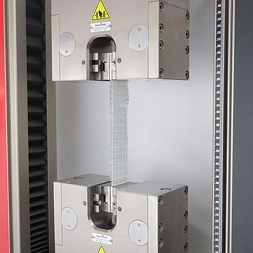 ISO 4606 Tensile test on textile glass - woven fabric with double pneumatic grips 20kN