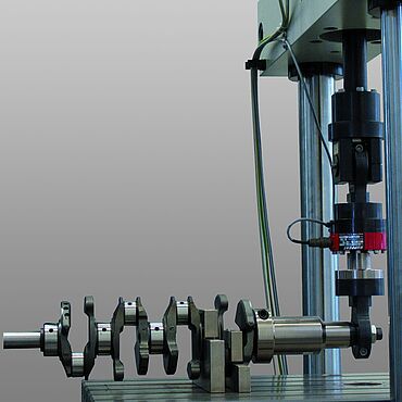 Flexure loading of crankshaft