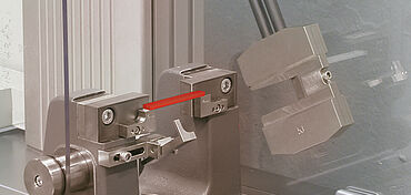 Charpy impact test on a plastic specimen; determining the absorbed energy