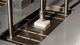 Test method according to ISO 306 and ASTM D1525 for determining the Vicat softening temperature, specimen and Vicat needle in detail view