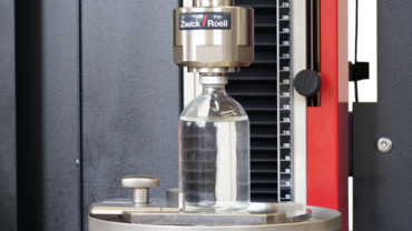 Perlengkapan uji untuk menentukan kekuatan segel sisa (RSF) pada botol yang dirujuk dalam USP 1207
