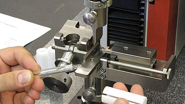 Detail view showing preparation of syringe holder
