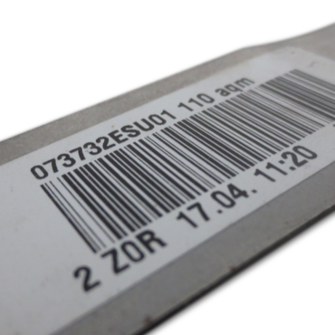 The bar code or 2D code is read during the automated sequence