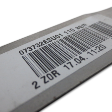The bar code or 2D code is read during the automated sequence