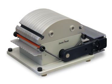 Film strip cutter for plastic specimen preparation