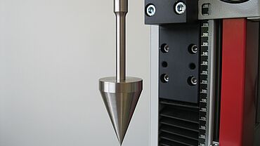 Customized test fixture – cone-shaped compression die