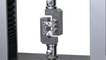 Dispositivo de cizalla V-notched rail