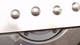 Close-up of a tested thin sheet sample after the sheet metal forming test
