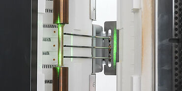 Specimen temperature measuring device, variable